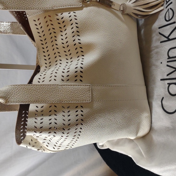 Calvin Klein Ivory Tote w/Tassel & Perforated Design - Picture 4 of 16